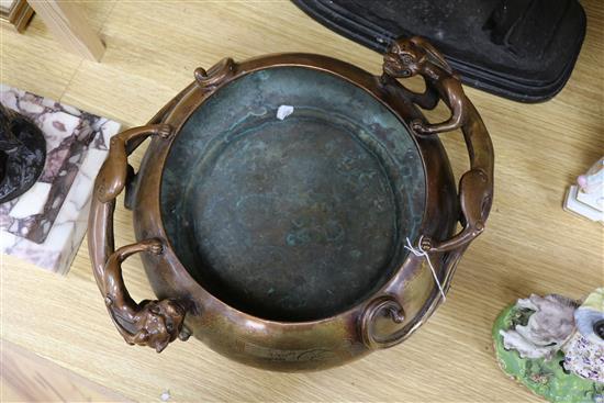 A large Chinese bronze dragon censer, Xuande mark length 38cm